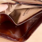 Trifold wallet interior showing cash compartment and synthetic lining