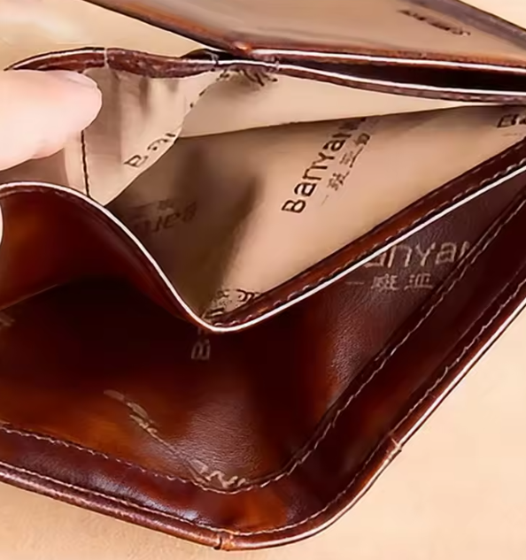 Trifold wallet interior showing cash compartment and synthetic lining
